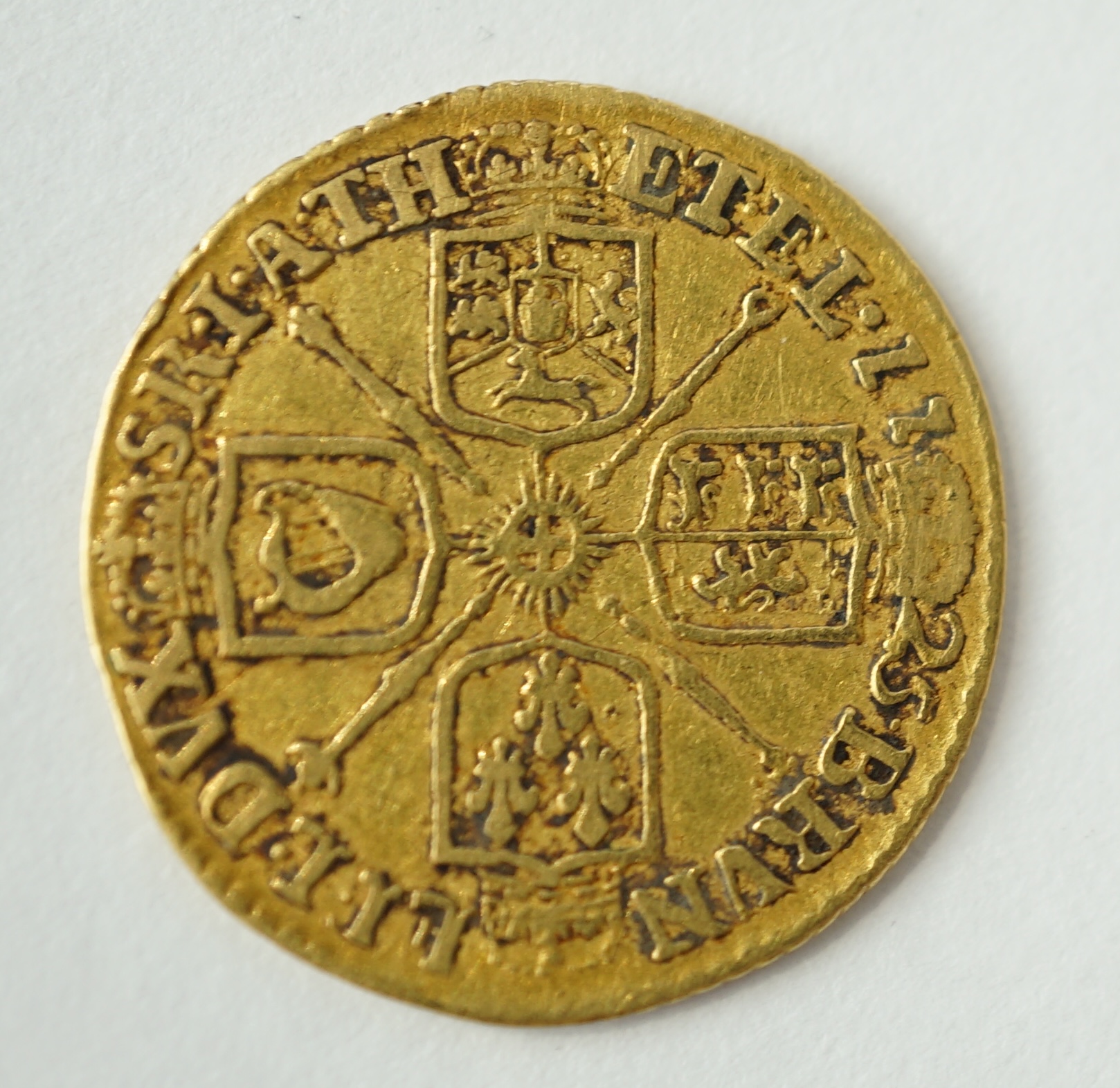 British gold coins, George I half guinea, 1725, possibly demounted at 1 o’clock otherwise fine or better